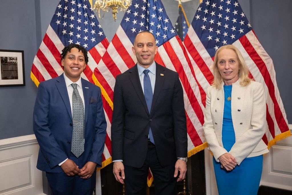 Teila Allmond, the recruitment coordinator and instructor for Rosie's Girls, with U.S. Reps. Hakeem Jeffries and Mary Gay Scanlon at the State of the Union on March 7, 2024.