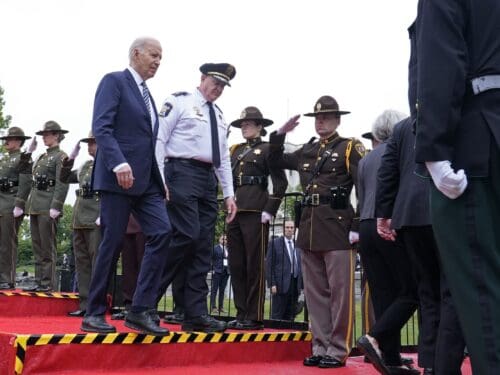 President Joe Biden, left, walks off of the stage with National Fraternal Order of Police President Patrick Yoes, during a memorial service to honor law enforcement officers who've lost their lives in the past year, during National Police Week ceremonies at the Capitol in Washington, Wednesday, May 15, 2024. (AP Photo/Susan Walsh)